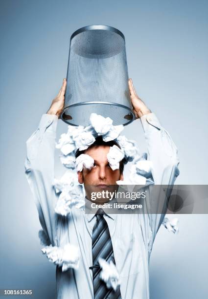 businessman throwing paper on his head - paper flipping stock pictures, royalty-free photos & images