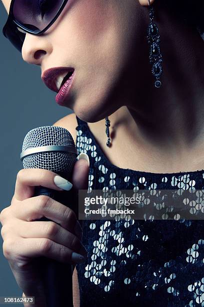 popstar - microphone mouth stock pictures, royalty-free photos & images