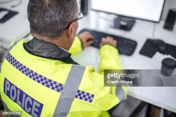 writing a report - police serbia stock pictures, royalty-free photos & images