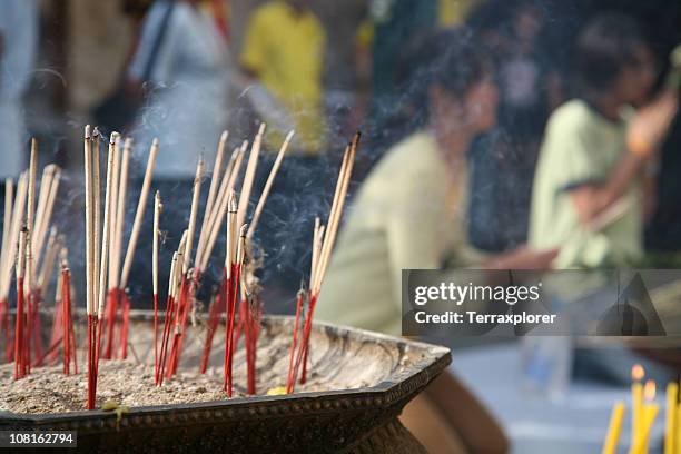 burning incense sticks, close up - incense stock pictures, royalty-free photos & images