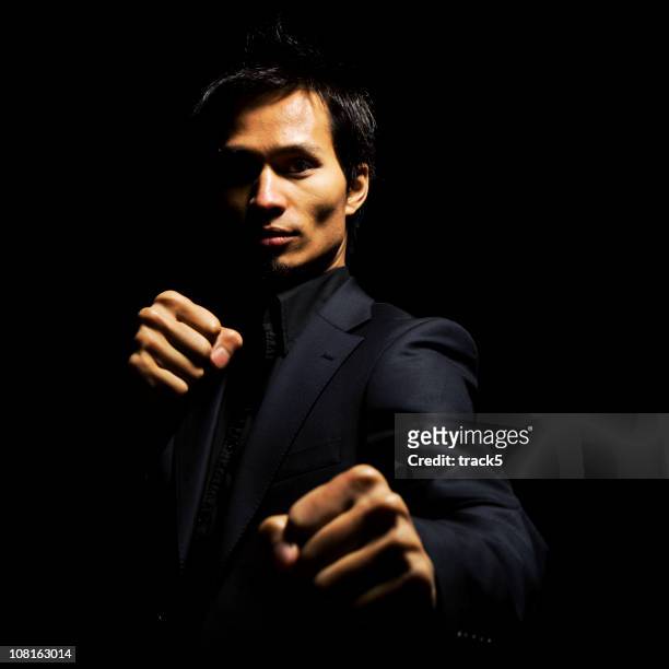 fighting back - fighting stance stock pictures, royalty-free photos & images