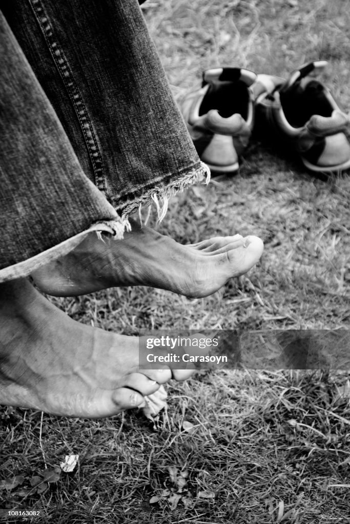 Portrait of Man's Feet with Shoes in Background