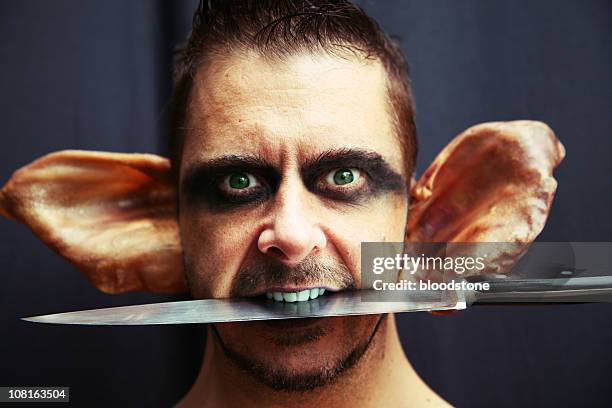 evil goblin - carrying in mouth stock pictures, royalty-free photos & images