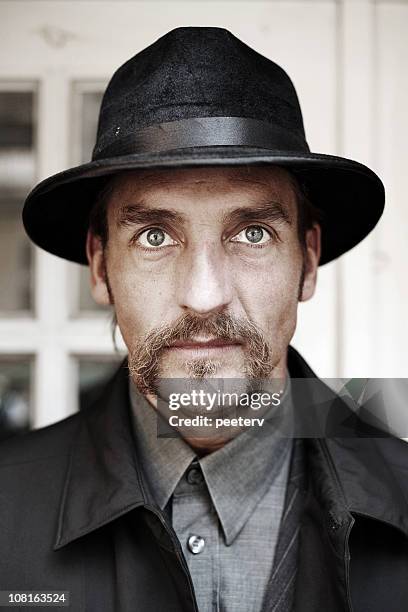 man with hat - handlebar moustache stock pictures, royalty-free photos & images