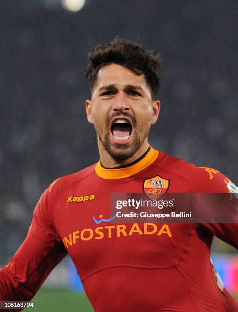Marco Borriello of Roma celebrates after scoring the opening goal during the TIM Cup match between AS Roma and SS Lazio at Stadio Olimpico on January...