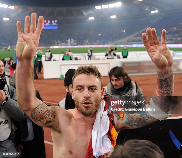 Daniele De Rossi of Roma celebrates the victory after the Tim Cup match between Roma and Lazio at Stadio Olimpico on January 19, 2011 in Rome, Italy.