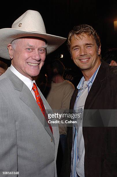 Larry Hagman and John Schneider during Warner Bros. Television and Warner Home Video Celebrate 50 Years of Quality TV - Red Carpet at Warner Bros....