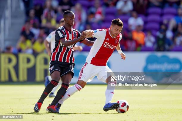 Helinho of Sao Paulo FC, Dusan Tadic of Ajax during the match between Sao Paulo FC v Ajax at the Orlando City Stadum on January 12, 2019 in Orlando...