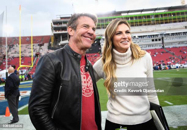 Dennis Quaid and FOX sportscaster Erin Andrews pose for photos before the Los Angeles Rams NFC Divisional Round playoff game against the Dallas...
