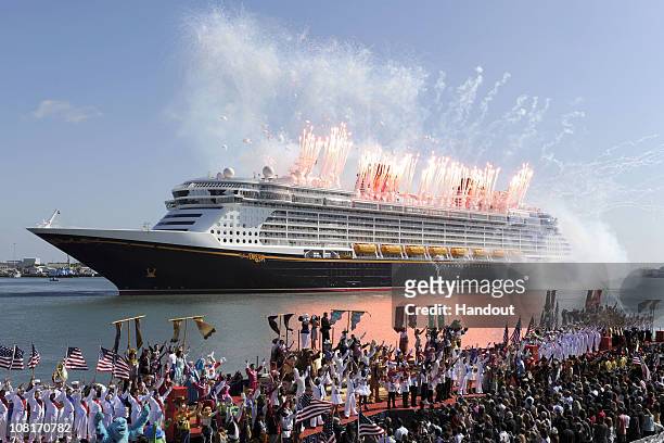 In this handout photo provided by Disney, fireworks explode over the new "Disney Dream" during the christening ceremony for the new cruise ship on...