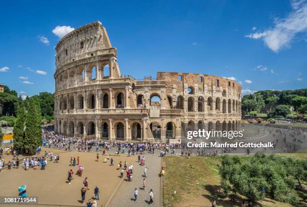 view of the colosseum amphitheatreseen from velian hill at the roman forum, rome, italy, june 28, 2018 - coliseo romano fotografías e imágenes de stock