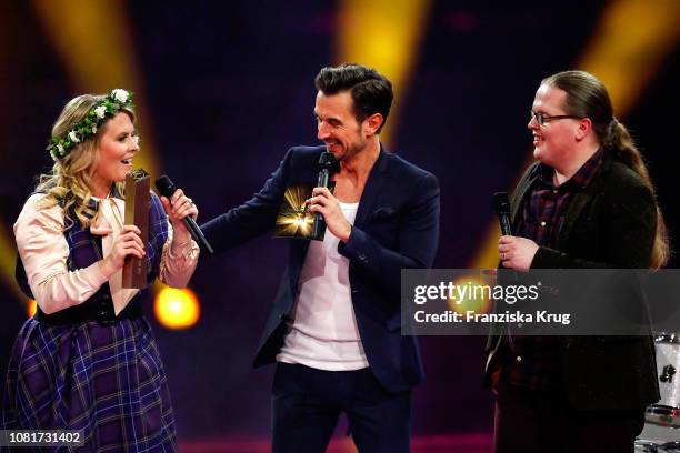 Maria Patricia Kelly, Florian Silbereisen and Angelo Kelly during the television show 'Schlagerchampions - Das grosse Fest der Besten' at Velodrom on...