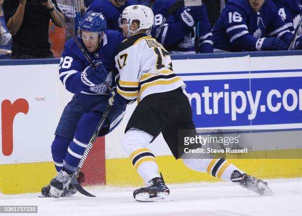 Toronto Maple Leafs right wing Connor Brown skates past Boston Bruins center Ryan Donato as the Toronto Maple Leafs fall to the Boston Bruins 3-2 at...
