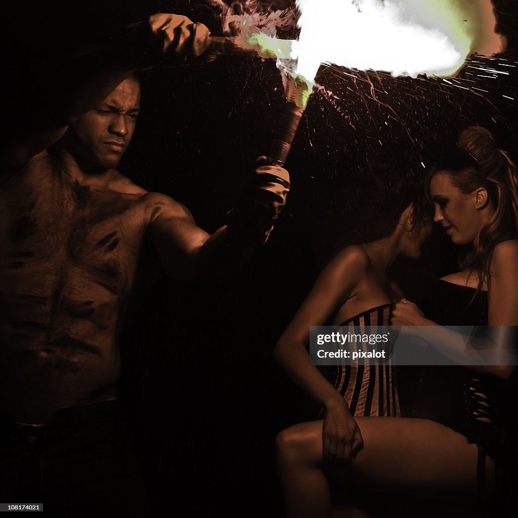 Man Playing with Flares and Women Flirting in Background