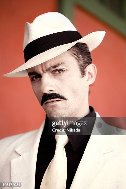 man with hat - gangster stock pictures, royalty-free photos & images