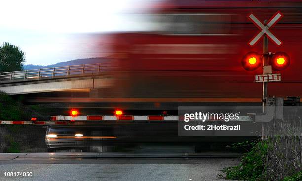 speeding train at railroad crossing, motion blur - signal strength stock pictures, royalty-free photos & images