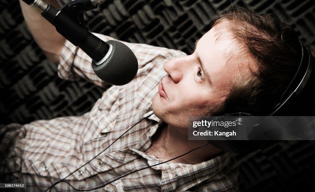 Radio DJ Talking into Microphone