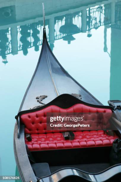 gondola with reflections of railing in water - venice gondola stock pictures, royalty-free photos & images