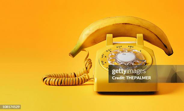 banana-telefon - vintage telephone stock-fotos und bilder