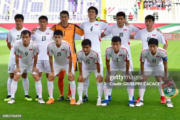 North Korea's defender Il Jin Ri, North Korea's defender Hyon Jin Sim, North Korea's goalkeeper Ri Myong-guk, North Korea's defender Song Gi Kim,...
