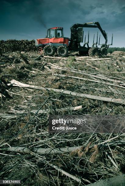 view of machine depicting remnants of deforestation - ontbossing stockfoto's en -beelden