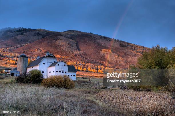 barn and rainbow - park city   utah stock pictures, royalty-free photos & images