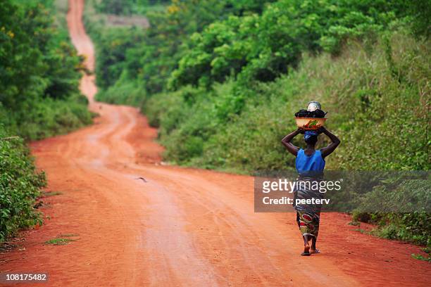 african woman on the road - native african ethnicity 個照片及圖片檔