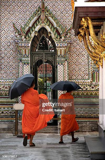 two monks in grand palace, bangkok, thailand - wat stock pictures, royalty-free photos & images