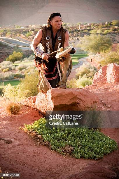 native american chief performing blessing - cherokee stock pictures, royalty-free photos & images