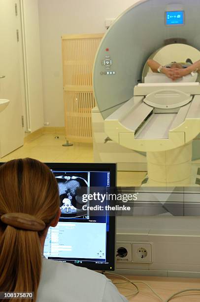 magnetic resonance imaging scan - person screened for cancer stock pictures, royalty-free photos & images