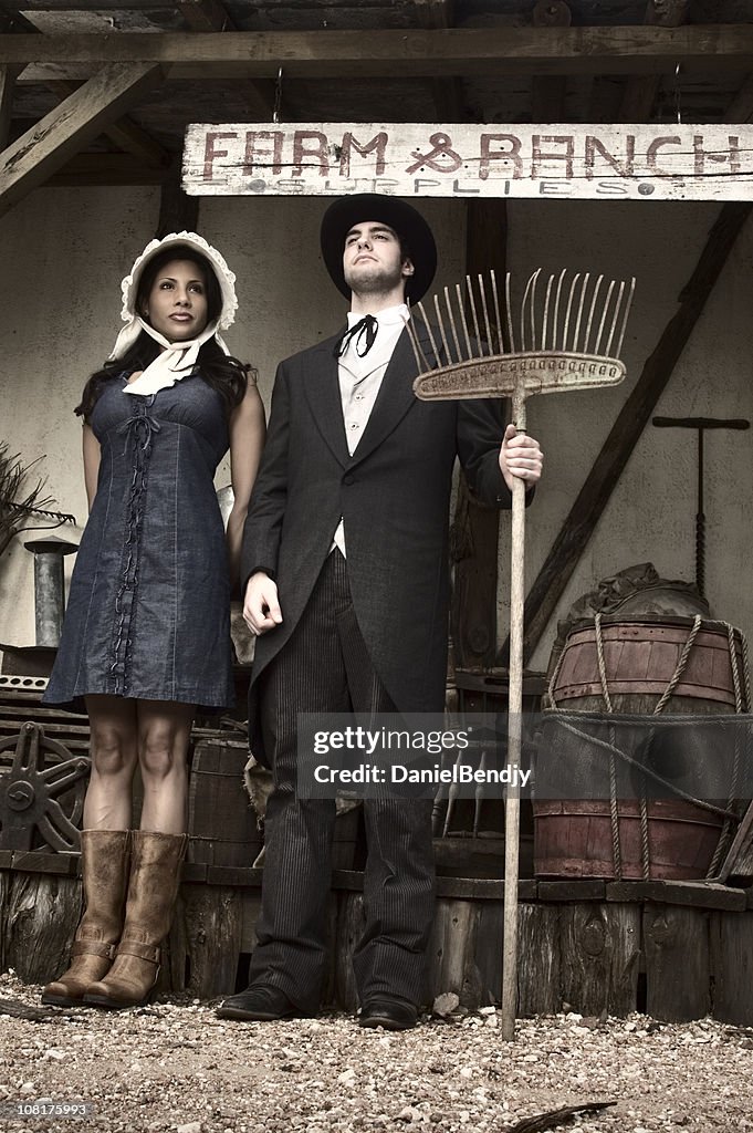 Western Couple Standing at Farm Ranch