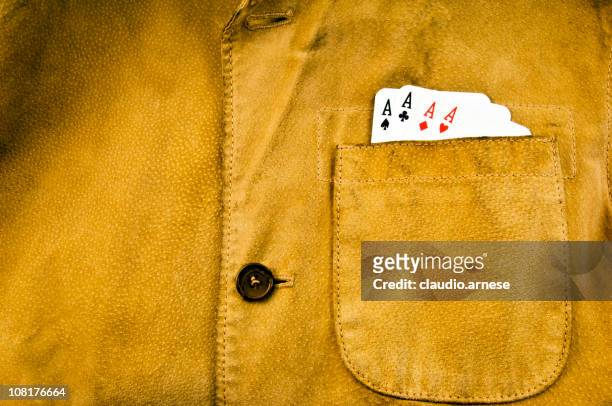 leather jacket with aces in pocket. color image - jacket pocket stock pictures, royalty-free photos & images