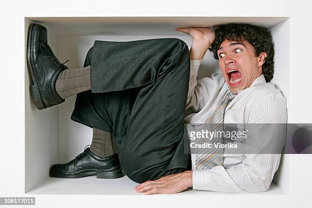 trapped businessman - stuck stock pictures, royalty-free photos & images