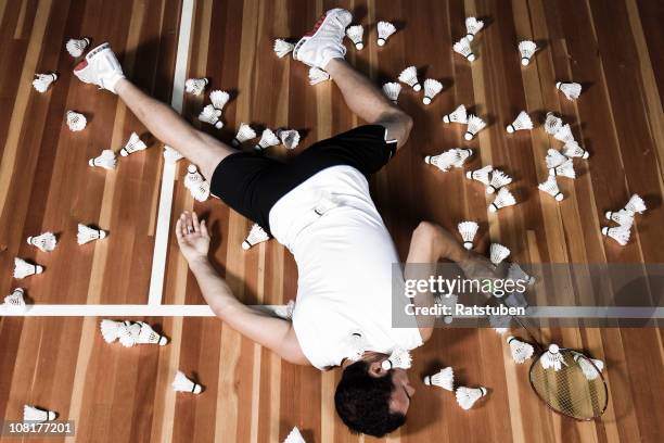 shuutle cocks knocked out - badminton stock pictures, royalty-free photos & images