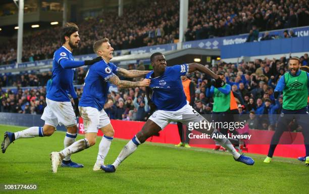 Kurt Zouma of Everton celebrates after scoring his team's first goal with Lucas Digne and Andre Gomes during the Premier League match between Everton...