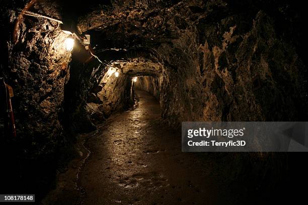 dark and wet sterling hill mine tunnel - cave stock pictures, royalty-free photos & images