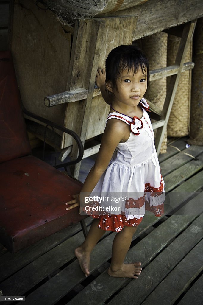 Portrait of Little Malaysian Girl Standing on Deck