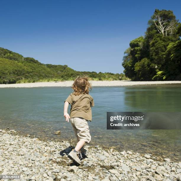 Girl Throwing Rocks Photos and Premium High Res Pictures - Getty Images