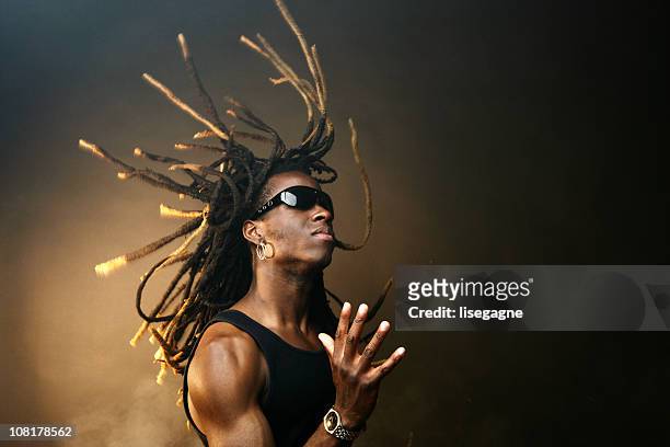 young man gesturing - dreadlocks stock pictures, royalty-free photos & images