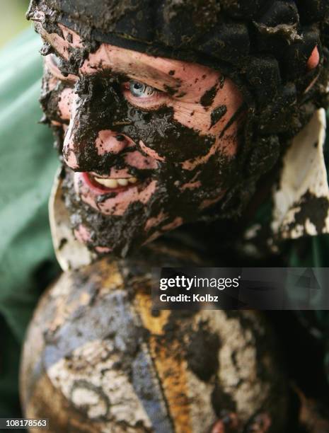 rugby player covered in mud - people covered in mud stock pictures, royalty-free photos & images