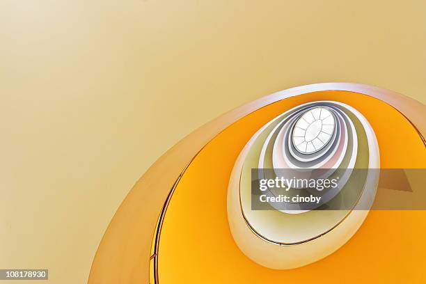 looking up at spiral staircase - london 1970s stock pictures, royalty-free photos & images