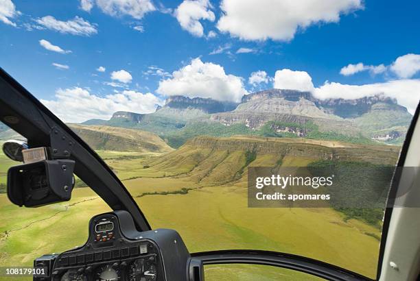 auyan tepuy mountain view from helicopter cockpit - helicopter view stock pictures, royalty-free photos & images