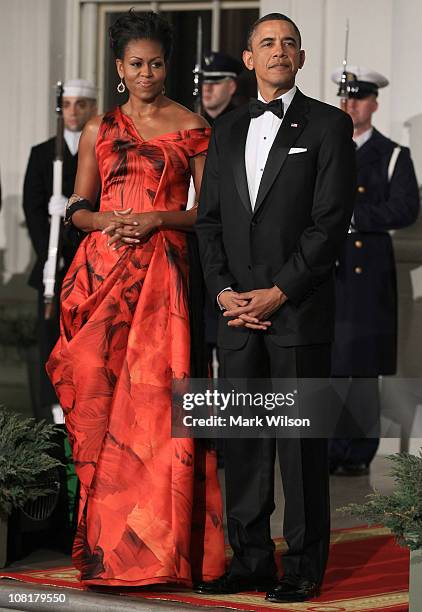 President Barack Obama and first lady Michelle Obama welcome Chinese President Hu Jintao for a State dinner at the White House January 19, 2011 in...