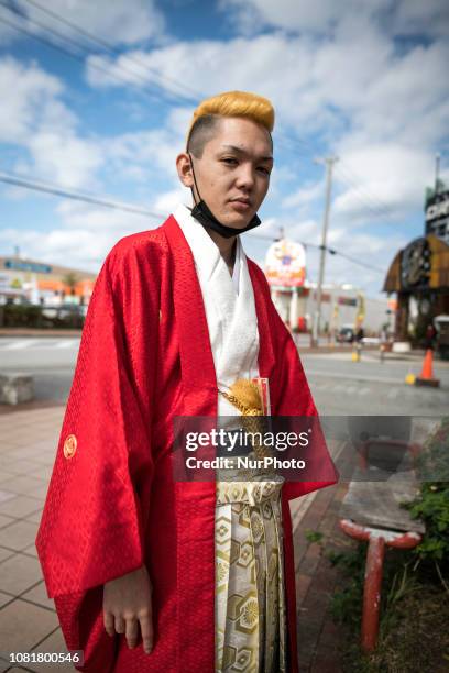 An Okinawan man wearing kimono posed for photo during the Coming of Age Day ceremony in Chatan, Okinawa City, Japan on January 13, 2019. The Coming...