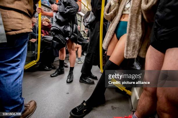 January 2019, Berlin: Participants of the action "No Pants Subway Ride" ride in underpants subway. The "No Pants Subway Ride" is a subway ride for...