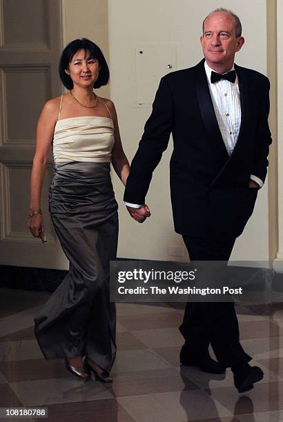 Washington, DC Designer Maya Lin and Daniel Wolf arrive before President Obama hosts Chinese President Hu Jintao at a State Dinner at the White...