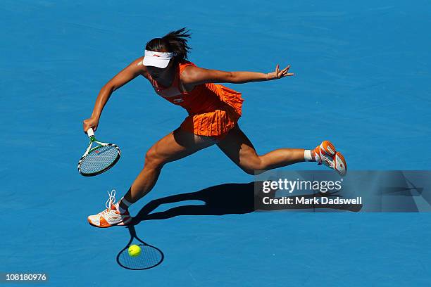 Shuai Peng of China plays a forehand in her second round match against Jelena Jankovic of Serbia during day four of the 2011 Australian Open at...