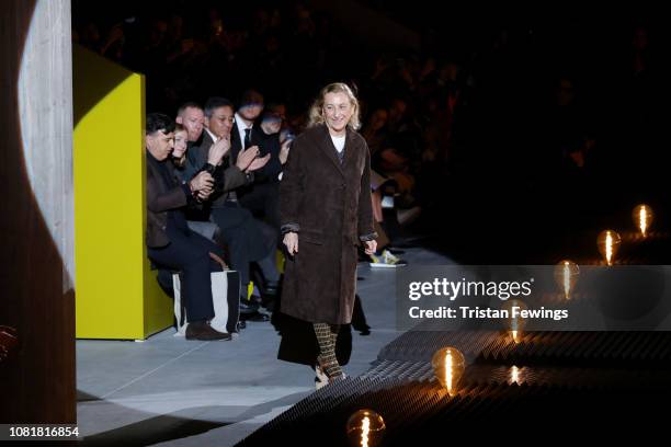 Miuccia Prada walks the runway during the finale of the Prada show during Milan Menswear Fashion Week Autumn/Winter 2019/20 on January 13, 2019 in...