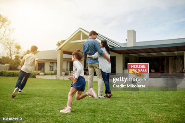 everyone is excited about the new house - standing sign stock pictures, royalty-free photos & images