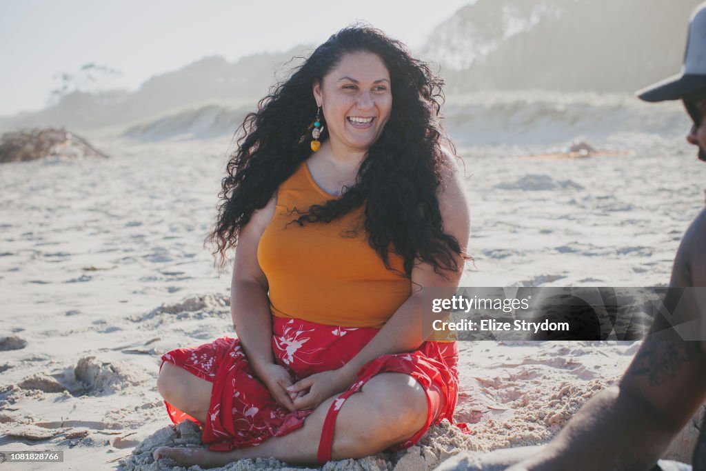 Aboriginal woman and her boyfriend at the beach